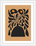 The image depicts a cross stitch pattern framed in white, showcasing a stylized design of black flowers with orange centers on a beige canvas. The flowers are arranged in an asymmetric composition, with the petals spread outward from a central point at the bottom of the canvas.