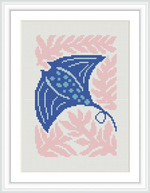 The image showcases a cross stitch pattern depicting a stingray. The stingray is primarily in shades of blue, set against a backdrop of pink coral-like motifs. The pattern is framed within a white border and displayed as if it's in a picture frame.