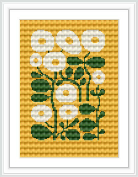 A digital illustration of a cross stitch pattern depicts a collection of stylized flowers with large white petals and green leaves against a yellow background, all contained within a white frame.