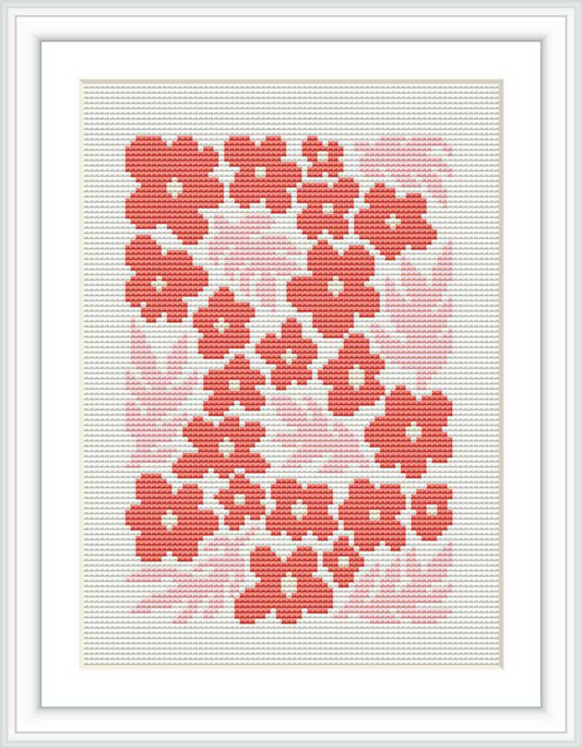 The image shows a cross stitch pattern of pink flowers with a gradient effect, framed in white, depicting several blooms with darker outlines and lighter fillings, presented on a grid background implying the cross stitch fabric.