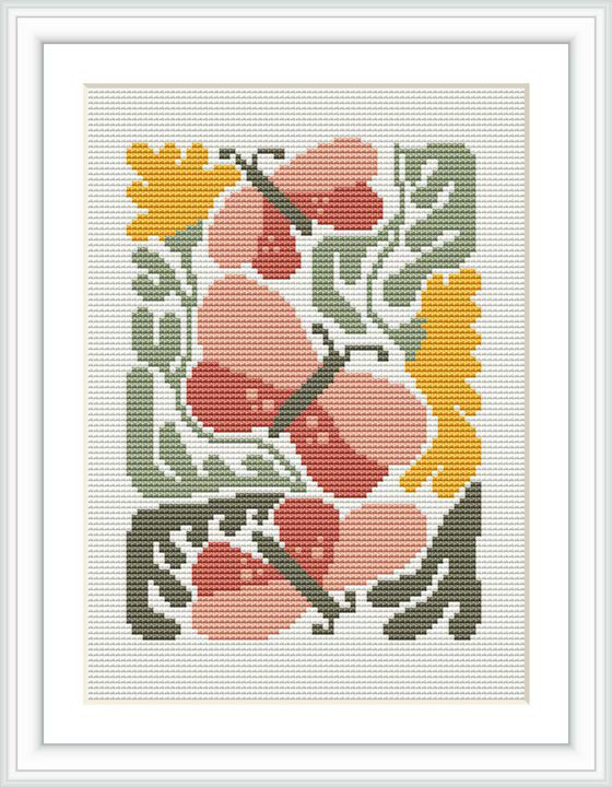 The image shows a framed cross stitch design with a floral pattern featuring coral blossoms and green leaves on a cream-colored canvas.