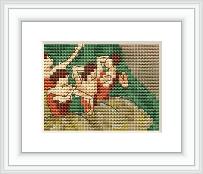 The image depicts a cross stitch pattern framed and hung on a wall, portraying four ballet dancers, presumably inspired by Edgar Degas' art. The dancers appear to be captured mid-motion, with a background that gradates in color, possibly imitating the stage or a rehearsal space.