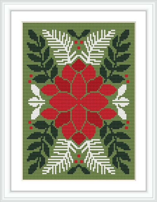 The image presents a framed cross stitch pattern of a Christmas poinsettia. The flower consists of red petals in the center with surrounding green leaves and white details. The pattern is symmetrically centered with a green background.