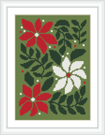 The image features a cross stitch pattern of three poinsettia flowers with green leaves against a green backdrop, encased in a white frame.