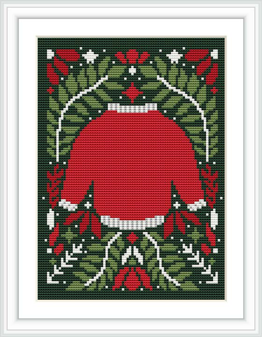 This cross stitch pattern depicts a red Christmas sweater design, framed by a border of green with white holly leaves, red berries, white snowflakes, and a bow at the top.