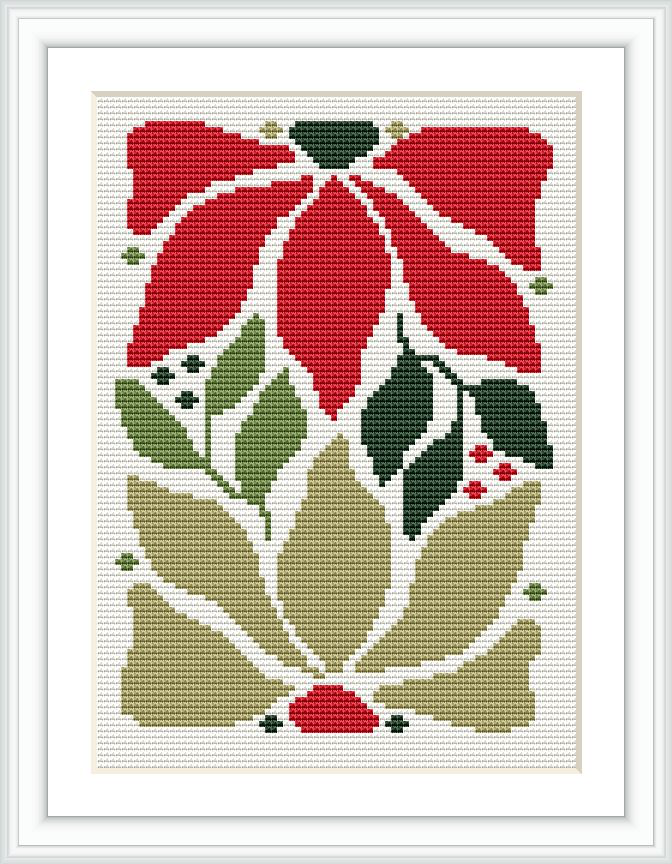 The image depicts a cross stitch pattern of a Christmas poinsettia with red petals and green leaves, surrounded by beige and green accents, framed within a simple white border on a cream-colored fabric.