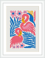 The image features two pink flamingos with blue and yellow detailing, nestled among blue and pink flowers with green foliage, all rendered in a pixelated cross-stitch style.