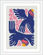 The image depicts a stylized bird with spread wings, featuring predominantly navy blue and pink colors, with floral motifs and touches of white, red, and yellow, framed within a traditional cross stitch canvas and border.