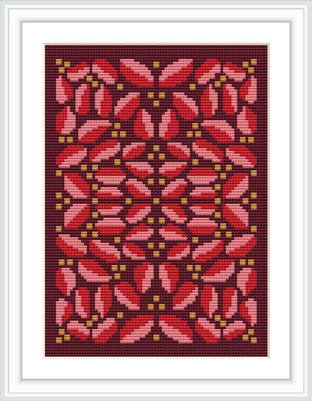 The image displays a symmetrical cross stitch pattern of Christmas poinsettias framed in a white border. It showcases a deep maroon background with a floral motif predominantly in red and green, accentuated with golden hues.