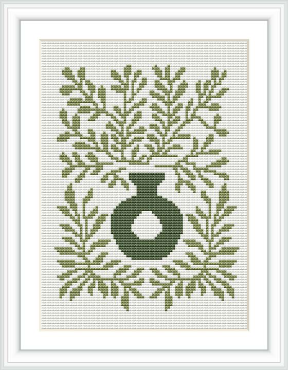 A monochromatic cross stitch pattern featuring a classical vase at the center, surrounded by symmetrical and detailed foliage patterns.