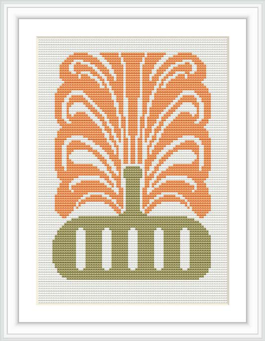 The image displays a cross-stitch pattern of an ornamental vase with a symmetric floral design. It is executed in warm colors, predominantly orange, with green accents for the vase.