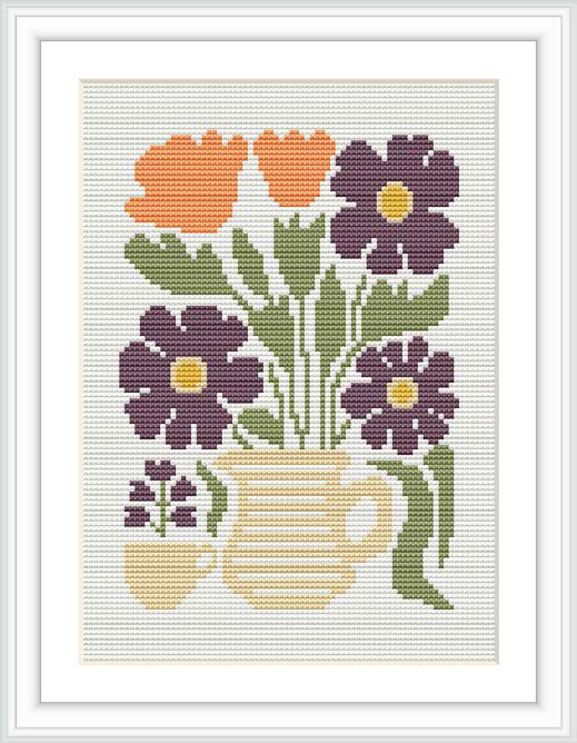 The image displays a framed cross stitch pattern of a flowerpot with blossoming flowers. The pot is yellow with striped details, set against a cream background. There are large purple flowers with green leaves and smaller orange blooms.