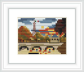This cross stitch pattern features a stylized representation of the Eiffel Tower set against a backdrop of rolling hills and a vibrant, cloud-filled sky, with a foreground that suggests an urban landscape.