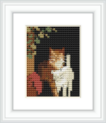 The cross stitch design features a mother cat with two kittens nestled beside her, surrounded by dark hues and elements of foliage and a red flower, set against a dark background.