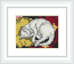 The image depicts a cross stitch design featuring a white cat curled up on a yellow pillow with a contrasting background consisting mainly of black, red, and grey hues. The design is framed, suggesting it's a finished piece.