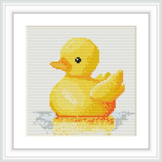 The image features a framed cross stitch pattern of a cute yellow duckling on a white background, with subtle touches of orange and grey, and a hint of blue to represent water below.