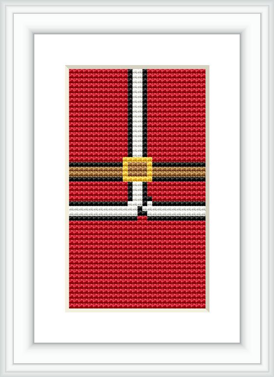 The image displays a framed cross stitch pattern of Santa's suit. The suit is depicted in a minimalist style, predominantly red with accents of gold, black, and white. It resembles the central portion of Santa's outfit, featuring a distinct belt with a golden buckle.