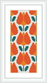 The image displays a framed cross stitch pattern featuring a symmetrical floral design in a vertical rectangular format, predominantly in orange and white with green accents.