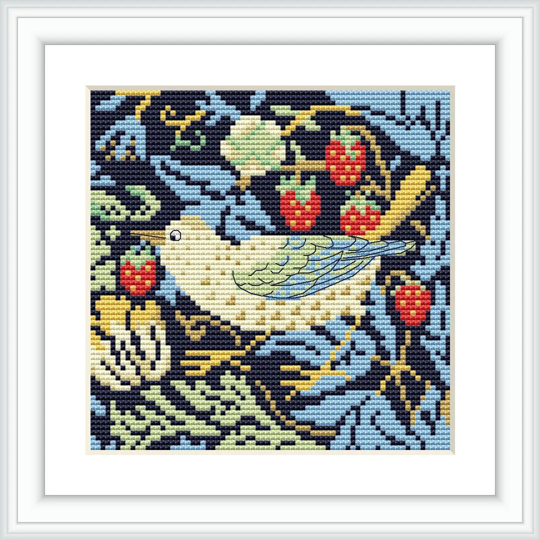 The image depicts a cross stitch pattern with a bird, possibly a thrush, surrounded by lush foliage and strawberries in various shades. The bird is centered within the design, with strawberry motifs and foliage extending towards the edges.