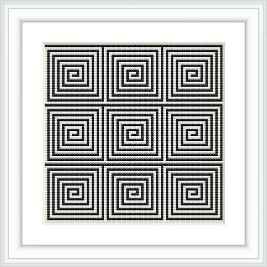 The image displays a framed cross stitch pattern with nine individual squares, each containing a repetitive geometric design of concentric squares, arranged in a 3x3 grid. The pattern exhibits a high-contrast color scheme inside a white frame.