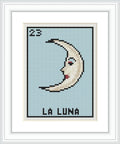 The image features the profile of a crescent moon with a face, centered within a light blue border, framed under the number 23, with 'La Luna' inscribed beneath. The background is a solid lighter shade of blue.