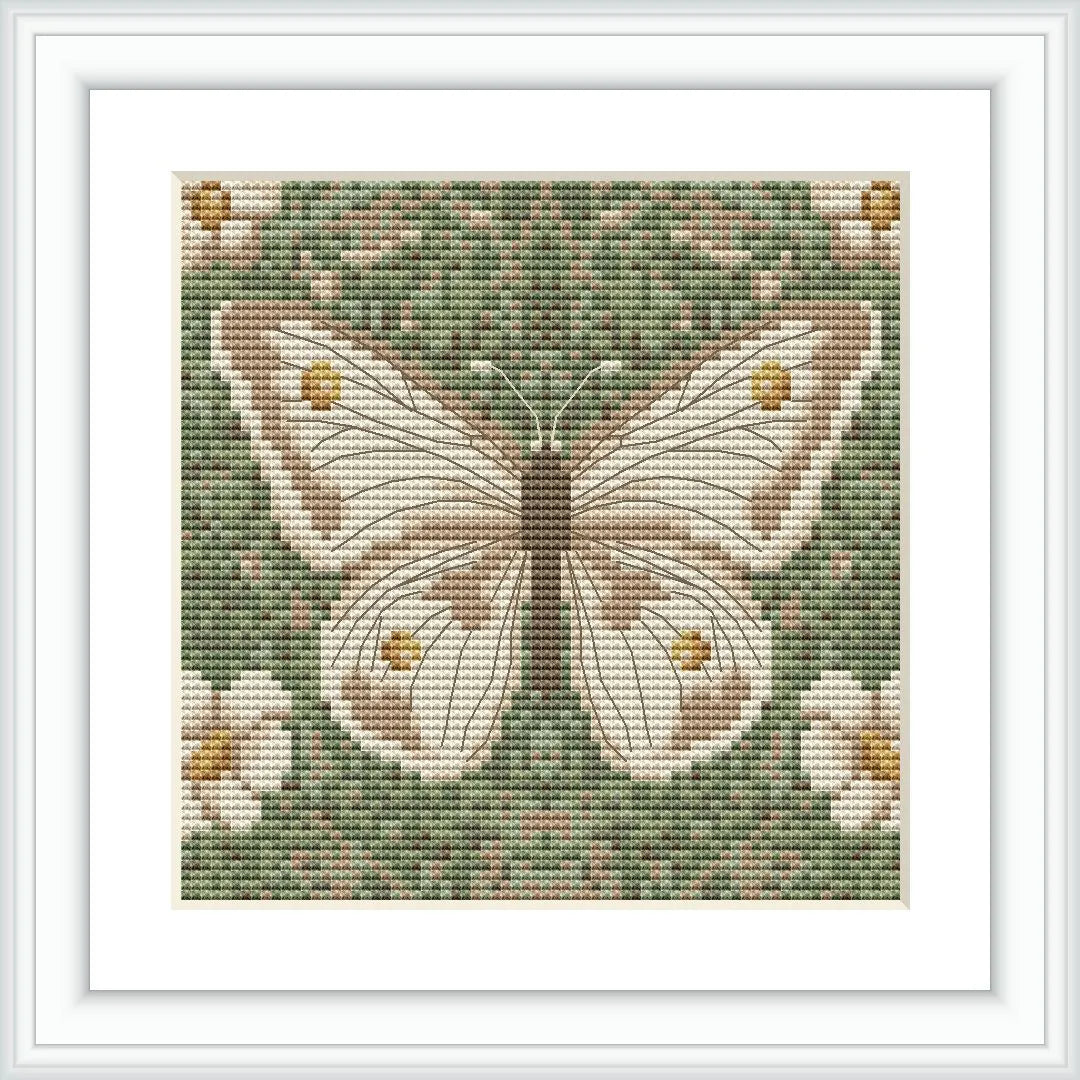 The image showcases a cross-stitch pattern with a centered, detailed butterfly motif surrounded by a field of flowers and foliage, set against a greenish background.