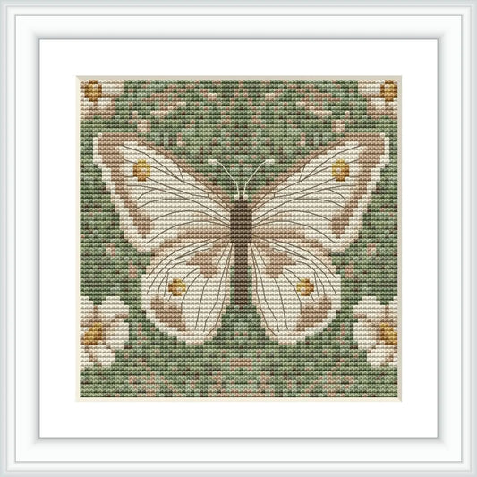 The image showcases a cross-stitch pattern with a centered, detailed butterfly motif surrounded by a field of flowers and foliage, set against a greenish background.